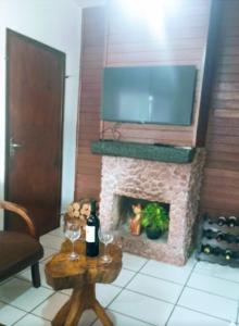 TV/trung tâm giải trí tại House Medeiros