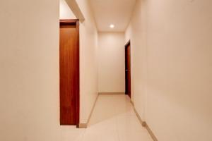 Fotografie z fotogalerie ubytování Townhouse Oak Ramdaspeth Downtown v destinaci Nágpur + 24 fotografií