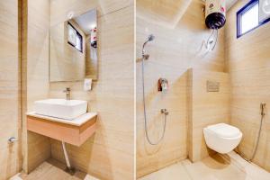 Un baño con lavabo, ducha e inodoro. en Super Collection O Dehradun Central Formerly Hotel Orange Residency, en Dehradun 28 fotos más