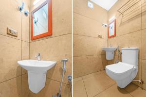 Koupelna v ubytování Super Townhouse Cochin Airport Formerly Skyluxe