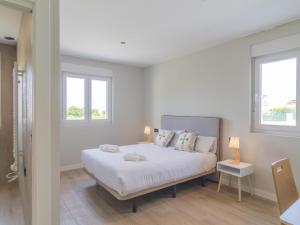 En eller flere senge i et værelse på Apartamento Mar Salada Piquel