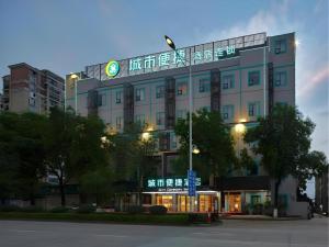 a building with a sign on top of it at City Comfort Inn Liuzhou Wuling Liutai Road in Liuzhou