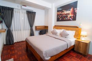 Ένα ή περισσότερα κρεβάτια σε δωμάτιο στο Checkpoint KTM Hostel +63 φωτογραφίες