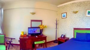 TV a/nebo společenská místnost v ubytování Juliana Hotel Colombo 03