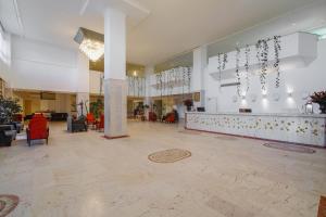 a lobby with a reception desk in a building at Sural Hotel in Side +45 photos