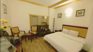 Postel nebo postele na pokoji v ubytování Juliana Hotel Colombo 03