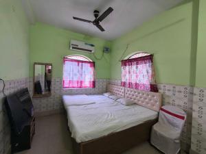 Postel nebo postele na pokoji v ubytování Hotel O B. S Marriage Palace