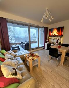 Et opholdsområde på Apartment Mountain Panorama + 11 billeder