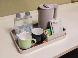 Tetera y cafetera en Dalian Zhongshan Square Seaview Meilun Hotel 86 fotos más