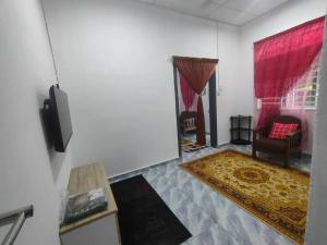 Et tv og/eller underholdning på Homestay Langkawi D'Puteh