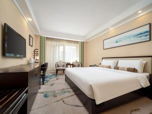 Телевизор и/или развлекательный центр в Guangdong Hotel +20 фотографий