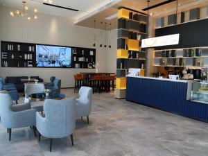 Un lugar para sentarse en Echarm Hotel Huanggang Tuanfeng Administration Service Center