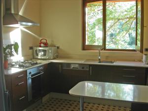 Kuchyň nebo kuchyňský kout v ubytování Casa Argentera