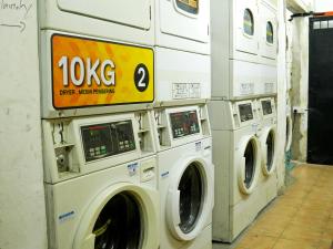 a group of washing machines in a laundromat at Mingle Lekiu in Kuala Lumpur +77 photos