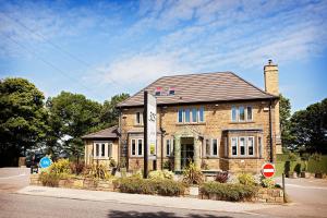 a brick house on the side of a street at 315 Bar & Restaurant in Huddersfield