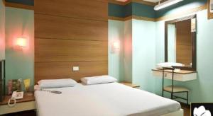 Postel nebo postele na pokoji v ubytování Hotel Sogo Tarlac + 60 fotografií
