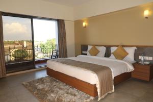 VITS Kamats Resort, Silvassa tesisinde bir oda