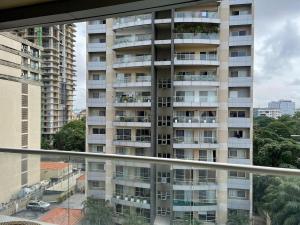 Bygningen som lejligheden ligger i + 1 billede