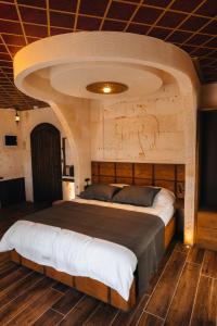 En eller flere senge i et værelse på Nora Inn Cappadocia