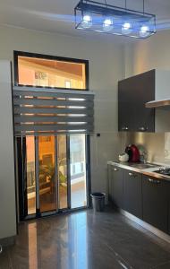 Køkken eller tekøkken på Residence Ndeye Ngouye