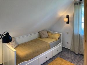 Letto o letti in una camera di Ferienhaus Prerow Altre 3 foto