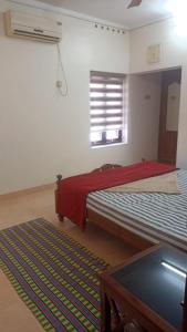 Ένα ή περισσότερα κρεβάτια σε δωμάτιο στο Moly's homestay