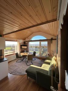 Et opholdsområde på NEU! Das kleine Rote Hoch-Haus