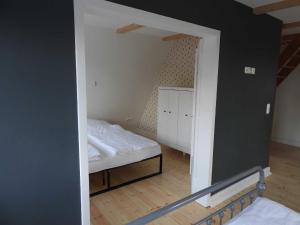 En eller flere senge i et værelse på Großes Ferienhaus in Graal-Müritz + 20 billeder