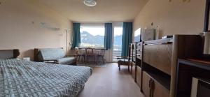 Postel nebo postele na pokoji v ubytování Ariana