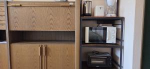 Kuchyň nebo kuchyňský kout v ubytování Ariana