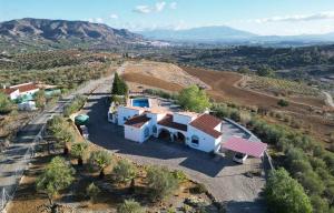 an aerial view of a house in a field at Villa Mika in Alora