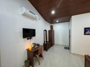 TV/trung tâm giải trí tại Manuvan Estate Stay