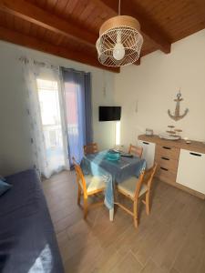 TV a/nebo společenská místnost v ubytování Casa Del Pescatore