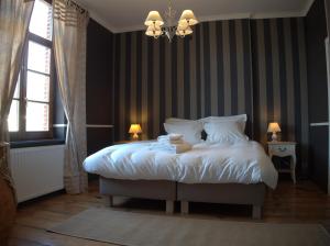 Postel nebo postele na pokoji v ubytování Hotel Vorsen