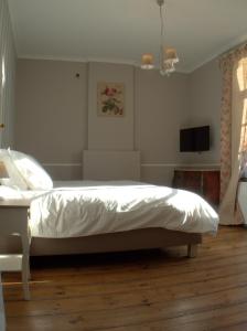 Postel nebo postele na pokoji v ubytování Hotel Vorsen