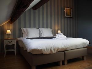 Postel nebo postele na pokoji v ubytování Hotel Vorsen