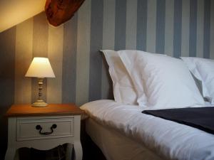 Postel nebo postele na pokoji v ubytování Hotel Vorsen