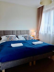 Postel nebo postele na pokoji v ubytování Willa Montis