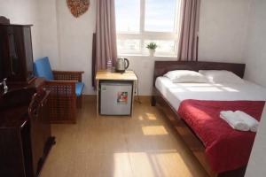 Postel nebo postele na pokoji v ubytování Thanh Tran Guesthouse Lý Sơn + 35 fotografií