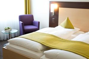 Voodi või voodid majutusasutuse Hotel Buchserhof toas