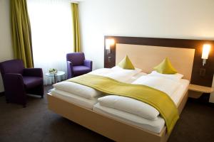 Voodi või voodid majutusasutuse Hotel Buchserhof toas