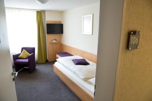 Voodi või voodid majutusasutuse Hotel Buchserhof toas