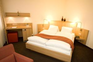 Voodi või voodid majutusasutuse Hotel Buchserhof toas