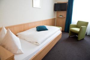 Voodi või voodid majutusasutuse Hotel Buchserhof toas
