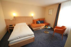Voodi või voodid majutusasutuse Hotel Buchserhof toas