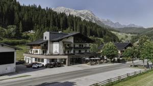 a large building on the side of a road at Das Filzmoos in Filzmoos