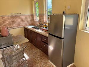 Nhà bếp/bếp nhỏ tại Cascade Retreat