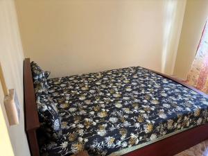 Giường trong phòng chung tại Cascade Retreat