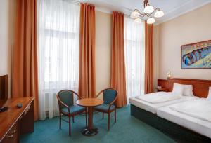 Postel nebo postele na pokoji v ubytování Hotel Westend + 27 fotografií