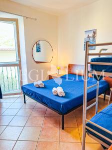 En eller flere senge i et værelse på Lucia